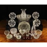 A Collection of Cut & Moulded Glassware: fruit-bowls, a set of four entree dishes,