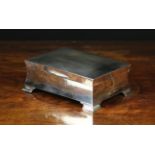 A Silver Art Deco Jewellery Box of rectangular form with a slightly domed lid and waisted sides on