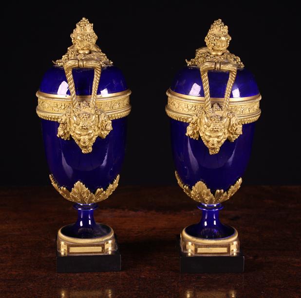 A Pair of Sèvres Style Porcelain Garniture Urns with decorative gilt bronze mounts. - Image 4 of 7