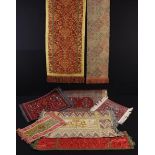 A Group of Five Decorative Textile Runners and Three Small Carpet Mats: The runners including one