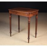 A Mahogany Hall Table having a moulded rectangular top with rounded corners on turned and stop