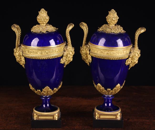 A Pair of Sèvres Style Porcelain Garniture Urns with decorative gilt bronze mounts. - Image 3 of 7