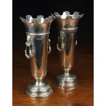 A Pair of Silver Vases by Hawksworth, Eyre & Co Ltd hallmarked Sheffield 1911-12.