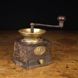 A 19th Century Brass & Cast Iron Coffee Mill with embossed brass oval label "A KENDRICK & SONS