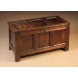 A Small Early 18th Century Joined Oak Coffer with triple panelled lid and front,