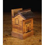 A 19th Century Treen Money Box in the form of a small brick-work building inlaid with marquetried
