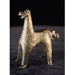 A Small Medieval Bronze Pricket Candlestick in the form of a quadruped with unusual bird tail,