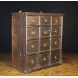 An 18th Century Oak Cabinet of Drawers,