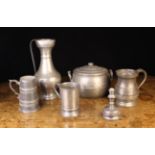 A Collection of Antique Pewter: A turned ewer 12" (30.