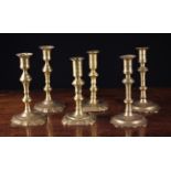 Three Pairs of 18th Century Brass Candlesticks, approx 7½" (19 cm) in height.