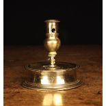 A 17th Century Spanish Brass Candlestick.