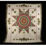 A Hand-Stitched Quilted Cotton Patchwork Bedspread, 20th Century.