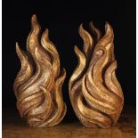 A Pair of Carved & Gilded Wooden Flames with hollowed out backs, Southern Netherlands, 17th Century,