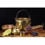 A Group of Antique Culinary Copper & Brassware: A large brass pot with iron swing handle,