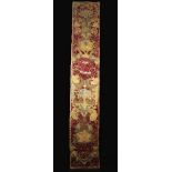 A Long 17th Century Hanging Vertical Banner (A/F) appliquéd and embroidered in coloured silks with