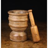 A 17th Century Turned Beechwood Pestle & Mortar. The pestle 9½" (24 cm) in length.