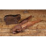 A Pair of Late 19th Century Chip Carved Treen Nut-Crackers and a naively cut animal form snuff box