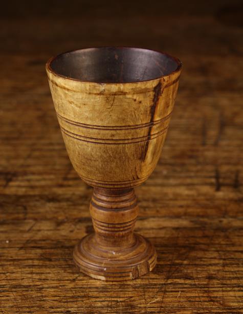 A Small 18th Century Turned Horn Whisky Toddy, on a ring turned stem and foot, 3" (7.