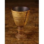 A Small 18th Century Turned Horn Whisky Toddy, on a ring turned stem and foot, 3" (7.