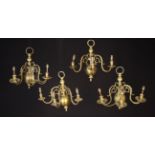 A Set of Four Dutch Brass Wall Sconces, late 19th/early 20th century.