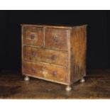 An 18th Century Miniature Painted Chest of Drawers.