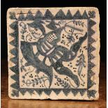 A Blue & White Glazed Terracotta Tile, Valencia, Late 15th Century,