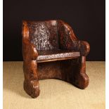 A Rustic Dug-out Arm Chair.