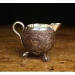 An Eastern Silver Metal Mounted Coconut Shell Jug.
