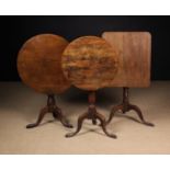 Three Country Tilt-top Tripod Tables Tripod Tables: A George III oak table having a circular top on