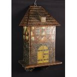 A Late 19th Century Wall Cabinet in the form of a Bavarian style house with carved details and
