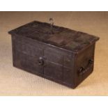 A 17th Century Wrought Iron Strong Box of rectangular form.