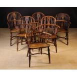 A Harlequin Set of Six Yew-wood Low Splat-back Windsor Armchairs with elm seats,