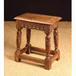 A 19th Century Oak Joint Stool in the James I Style.