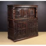 A Fine 17th Century Oak Court Cupboard dated 1675.