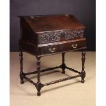 An Early 18th Century Boarded Oak Desk Box on Stand.