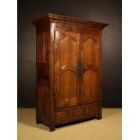 An Early 19th Century French Joined Chestnut Armoire.