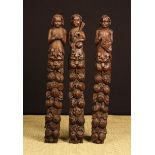 A Set of Three 17th Century Carved Oak Terms depicting minstrels playing period instruments;