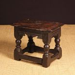 A 17th Century Low Oak Joint Stool.