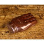 A Treen Snuff Box carved in the form of a hand with a hinged pewter lid to the palm,