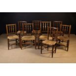 A Harlequin Set of Eight Dales Ash Spindle-back Chairs including two armchairs,