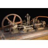A Rare Late 19th Century Hand-built Standing Steam Engine/Pump with large single flywheel,