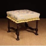 A Queen Anne Upholstered Walnut Stool.