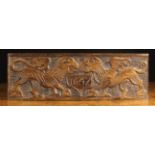 A Carved Oak Panel emblazoned with a pair of gouge carved winged griffins flanking a shield dated