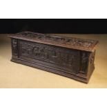 An Antique Carved Walnut Casonne.