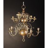 An Early 19th Century Bronze Twelve Branch Chandelier in the Dutch 17th Century style.