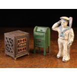 Three American Painted Cast Iron Money Banks: A miniature safe with hinged door,