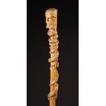 A Fine Carved Treen Walking Stick.