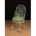 A French Painted Wirework Conservatory Chair having a decorative scrollwork back,