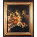 Antwerp School: A 17th Century Oak on Panel: The Holy Family with angels to one side offering the