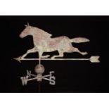 An Antique Copper Weather Vane composed of embossed sheet metal in the form of a running horse,